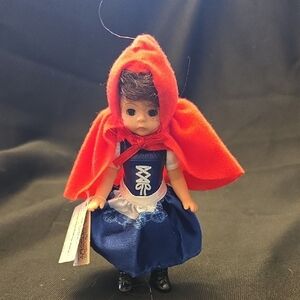 Madame Alexander Doll with Red Cape and Blue Dress